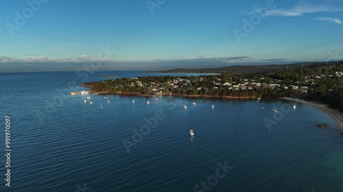 Wallpaper Mural Coles Bay Town on Tasmania during sunny day. Parking boat at lagoon. Small city with idyllic landscape at coastline. Aerial wide shot. Torontodigital.ca