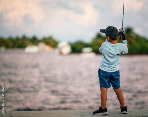 boy fishing in the marina coconut grove miami 