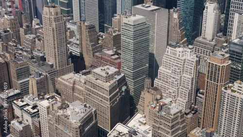 Slow motion landscape of city skyscrapers towers buildings urban CBD skyline of Manhattan New York USA America architecture infrastructure design commercial Empire State