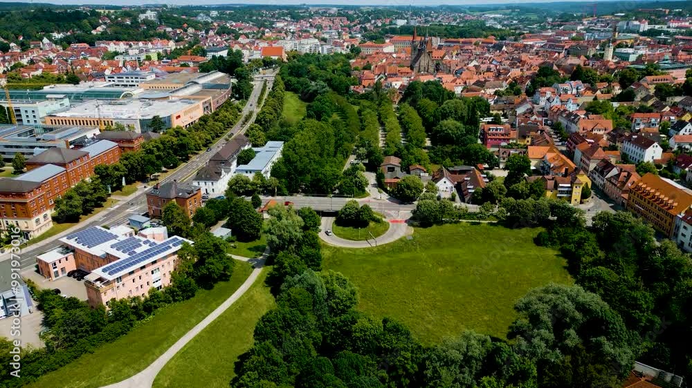 4K Aerial Drone Video of Rezatparkplatz West Parking Lot along the Frankische Rezat River in Ansbach, Germany