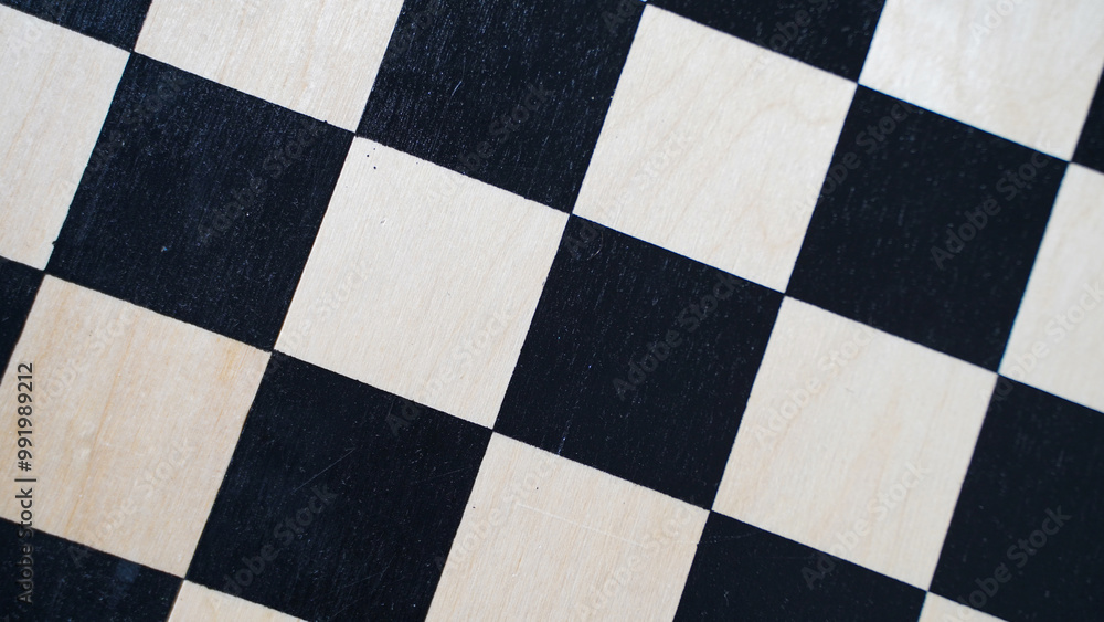 Fototapeta premium The texture of a wooden chessboard