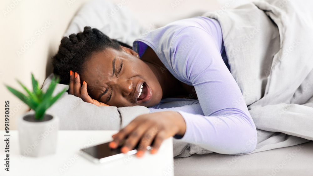 Morning Headache. Afro Woman Touching Head Suffering From Pain Lying In Bed Awaking At Home Morning Headache. Afro Woman Touching Head Suffering From Pain Lying In Bed Awaking At Home