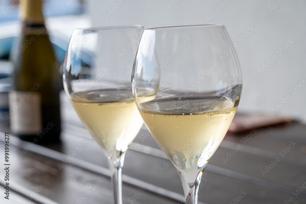 Tasting of brut and reserve grand cru champagne sparkling wine produced by traditional method in Mesnil-sur-Oger in Champagne, France Tasting of brut and reserve grand cru champagne sparkling wine produced by traditional method in Mesnil-sur-Oger in Champagne, France