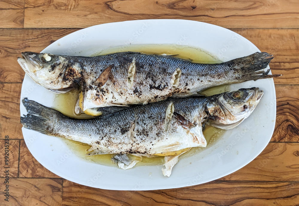 Excellent grilled fish recipe, food and leisure concepts Excellent grilled fish recipe, food and leisure concepts