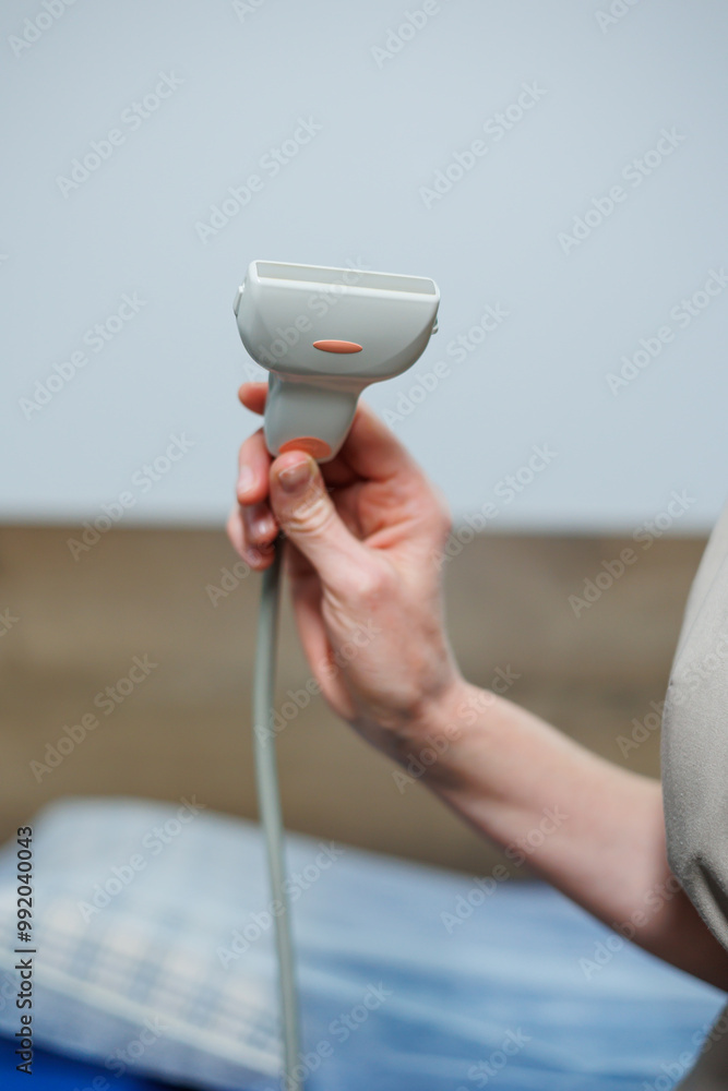 Fototapeta premium Ultrasound machine for body examination. Modern apparatus in the doctor's office.