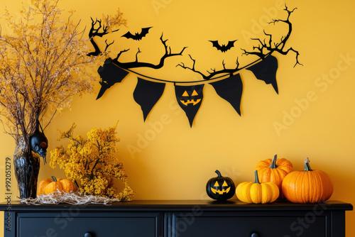 stylish black and yellow halloween banner features spooky silhouettes against a minimalist background for modern decor photo