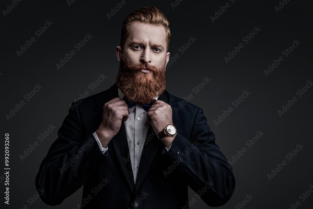 Φωτογραφία Tuxedo man in menswear suit jacket formal style isolated on grey, copy space