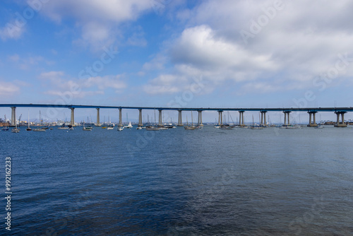 Wallpaper Mural San Diego bay and the Coronado Bridge with ships sailing on blue ocean water, office buildings and skyscrapers along the coast at Coronado Tidelands Park in Coronado California Torontodigital.ca