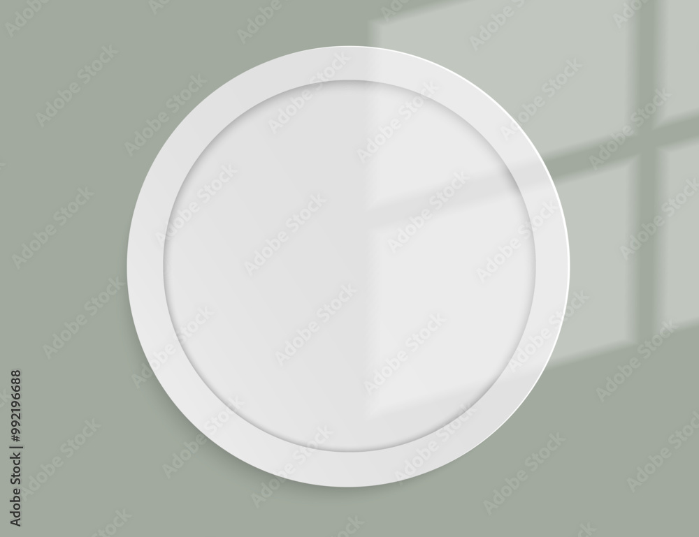 White round frame with sunlight on the green wall. Vector mockup with space for your design. White round frame with sunlight on the green wall. Vector mockup with space for your design.