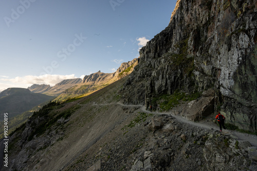 Hiker Heads Out On The Highline Trail In Glacier