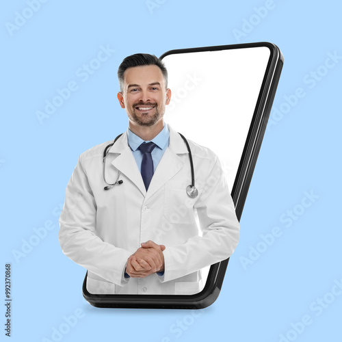 Online doctor standing out of mobile phone screen on light blue background