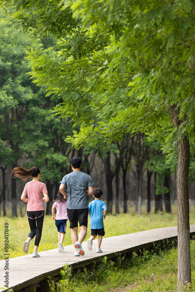 Happy Family Jogging In The Morning Happy Family Jogging In The Morning