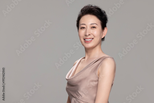 Studio Shot Of Beautiful Mature Woman photo