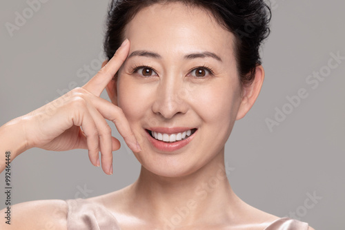 Studio Shot Of Beautiful Mature Woman photo