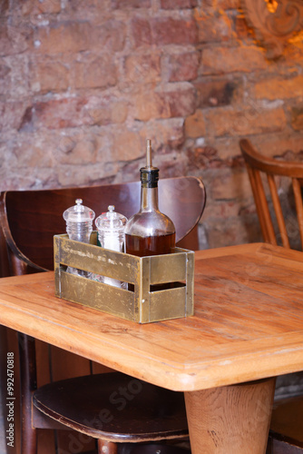 Beautifully Charming Restaurant Table Setting Displayed with Various Condiments and More