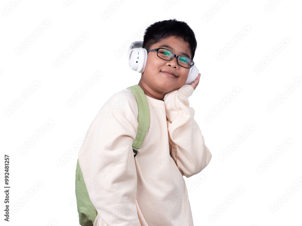 Portrait of boy in casual clothes carry a green bag and white headphones isolated on a white background, The concept of education and way of life. Cute boy posing in casual clothes with clipping part. Portrait of boy in casual clothes carry a green bag and white headphones isolated on a white background, The concept of education and way of life. Cute boy posing in casual clothes with clipping part.