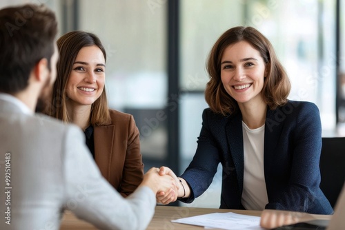 Professional handshake in modern office setting photo