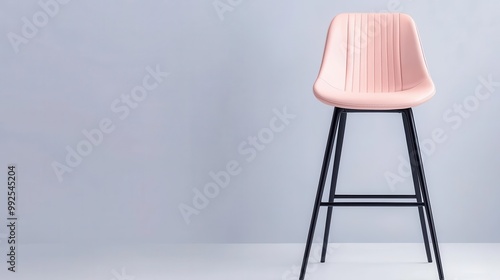 High chair with a minimalist silhouette and a soft, wipeable leatherette cushion, wipeable cushion, hassle-free cleaning