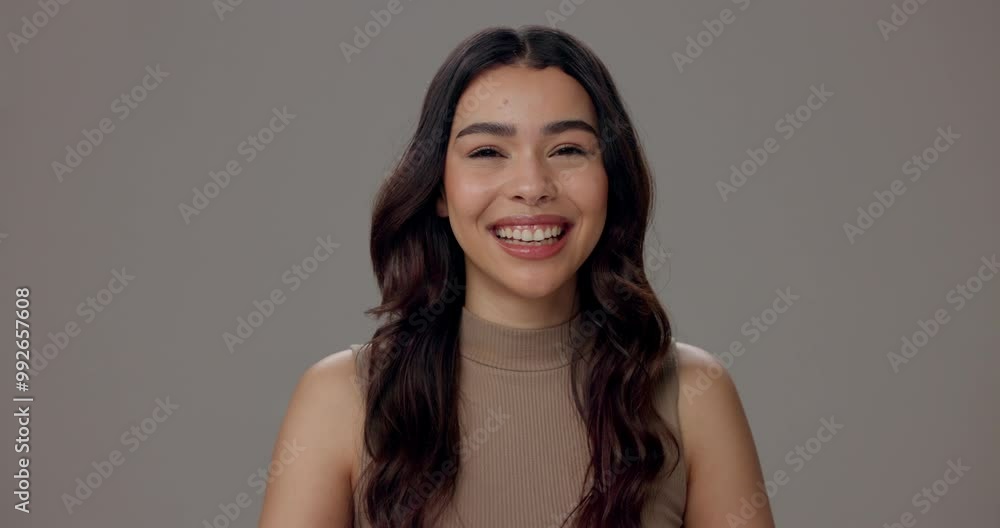 Portrait, laugh and woman with smile, natural makeup and confidence on grey studio background. Face, happy model and satisfaction with cosmetic, salon grooming and facial treatment for beauty glow Portrait, laugh and woman with smile, natural makeup and confidence on grey studio background. Face, happy model and satisfaction with cosmetic, salon grooming and facial treatment for beauty glow
