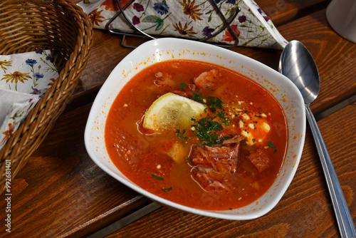 Tasty Russian-Ukrainian solianka soup photo