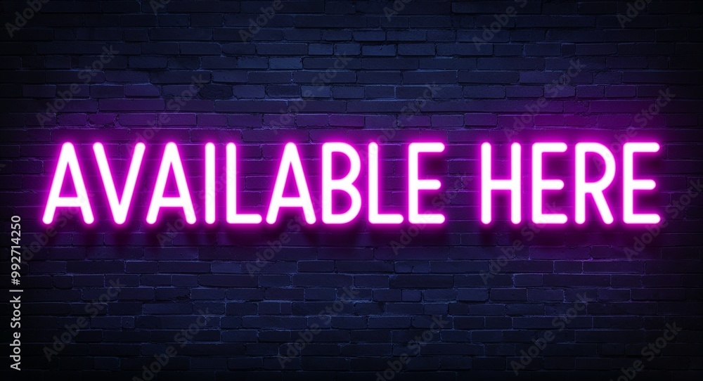 Available here word lettering glowing with neon light on dark brick wall background Available here word lettering glowing with neon light on dark brick wall background