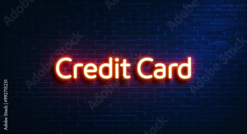 Credit card word lettering glowing with neon light on dark brick wall background