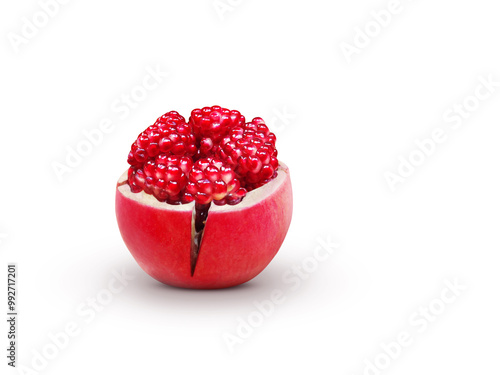 Fresh pomegranate. Picture of a pomegranate cut in half to reveal the seeds inside. photo