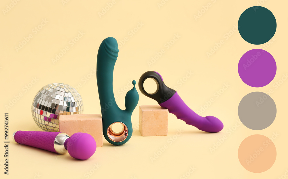 Different sex toys and disco ball on beige background. Different color patterns Different sex toys and disco ball on beige background. Different color patterns