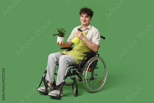 Young male gardener on whee...