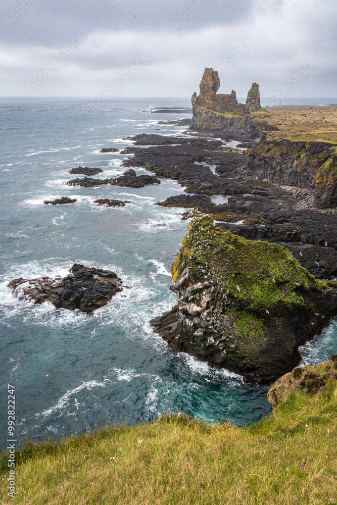 Londrangar Basalt Cliffs (Hellnar) in Iceland Londrangar Basalt Cliffs (Hellnar) in Iceland