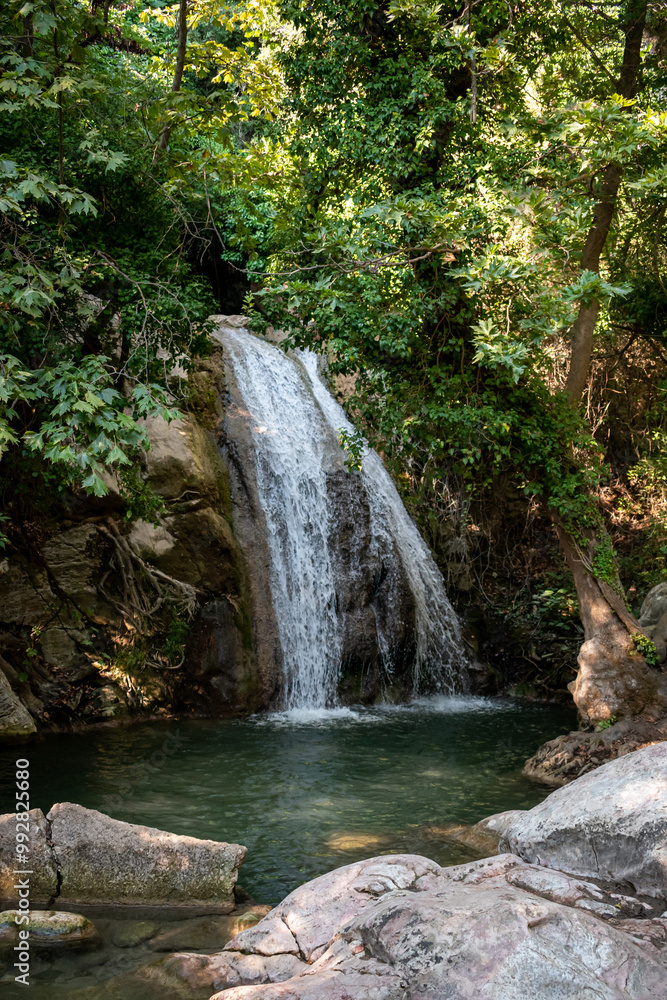 Fototapeta premium Beautiful waterfall Kefalogourna in Theologos, Thassos, Greece