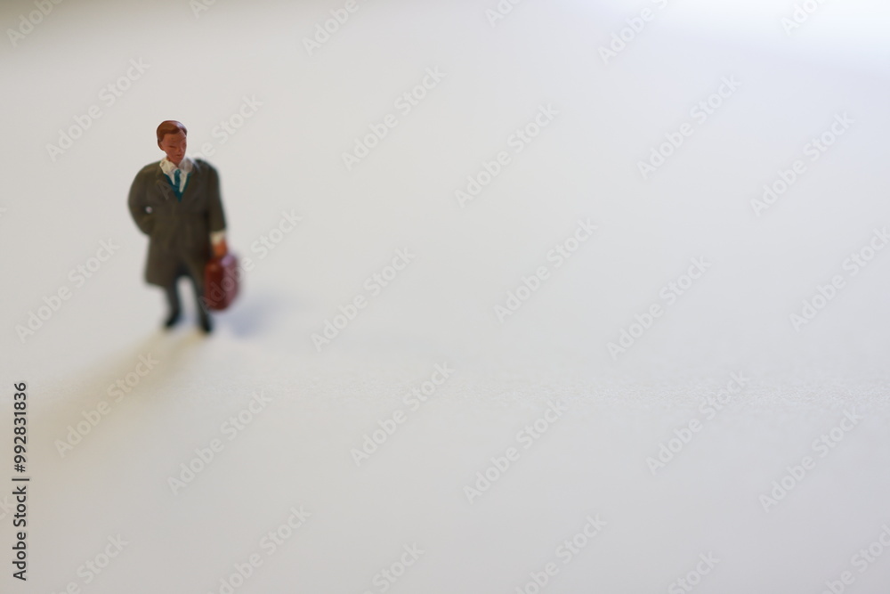 Micro manager, plastic figure, on white background. Micro manager, plastic figure, on white background.