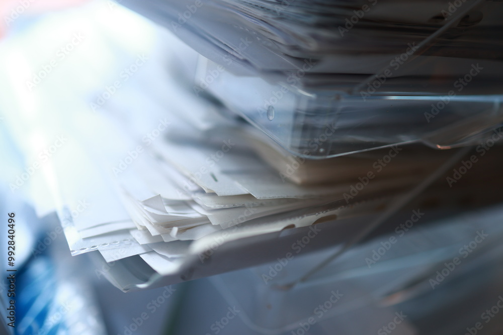 Stack of magazines, books, papers in the office. Stack of magazines, books, papers in the office.