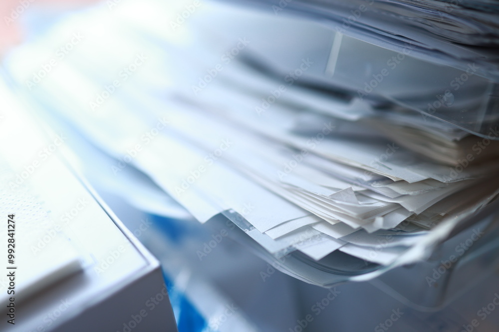 Stack of magazines, books, papers in the office. Stack of magazines, books, papers in the office.