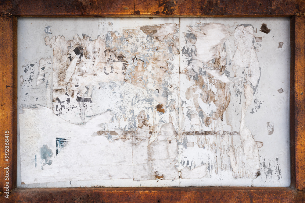 Old advertising board with rusty frame background Old advertising board with rusty frame background