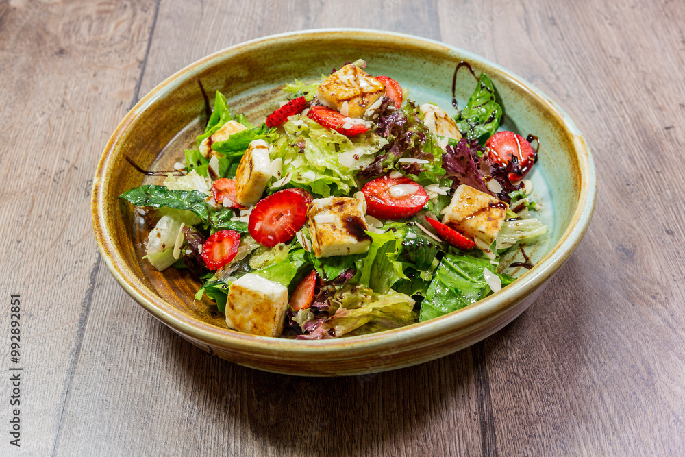 delicious fresh salad. salad with tomatoes, cucumbers and other vegetables with toasted bread and looking great. delicious fresh salad. salad with tomatoes, cucumbers and other vegetables with toasted bread and looking great.