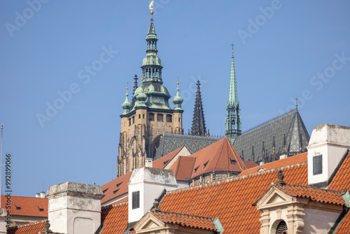 Obraz na płótnie View of Hradcany hill with towers of St. Vitus Cathedral on background of blue sky, Prague, Czech Republic w salonie