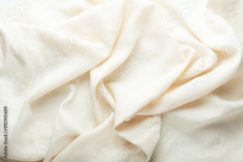 stonewashed linen fabric in dark cream color photo