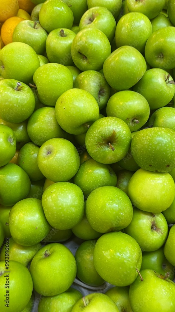 Apples,Plum, peach fruits for sale in the market.A bunch of fresh and ripe fruits are for sale .Fruits stall at fruit market.Fruits backgrounds Apples,Plum, peach fruits for sale in the market.A bunch of fresh and ripe fruits are for sale .Fruits stall at fruit market.Fruits backgrounds
