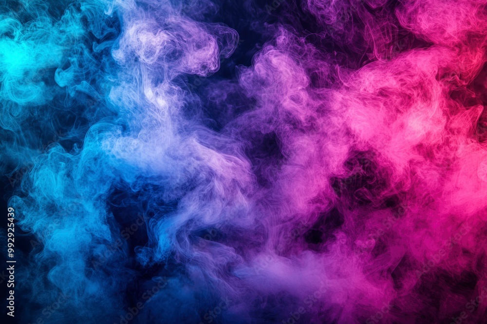 Fototapeta premium Abstract Swirling Blue and Pink Smoke on Black Background
