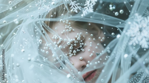 Portrait of a girl in a veil with beads 