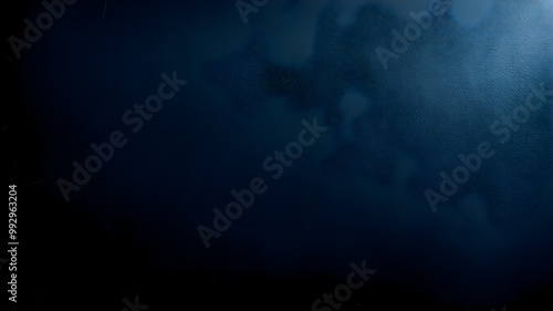 abstract dark blue background texture with some spots and spots on it