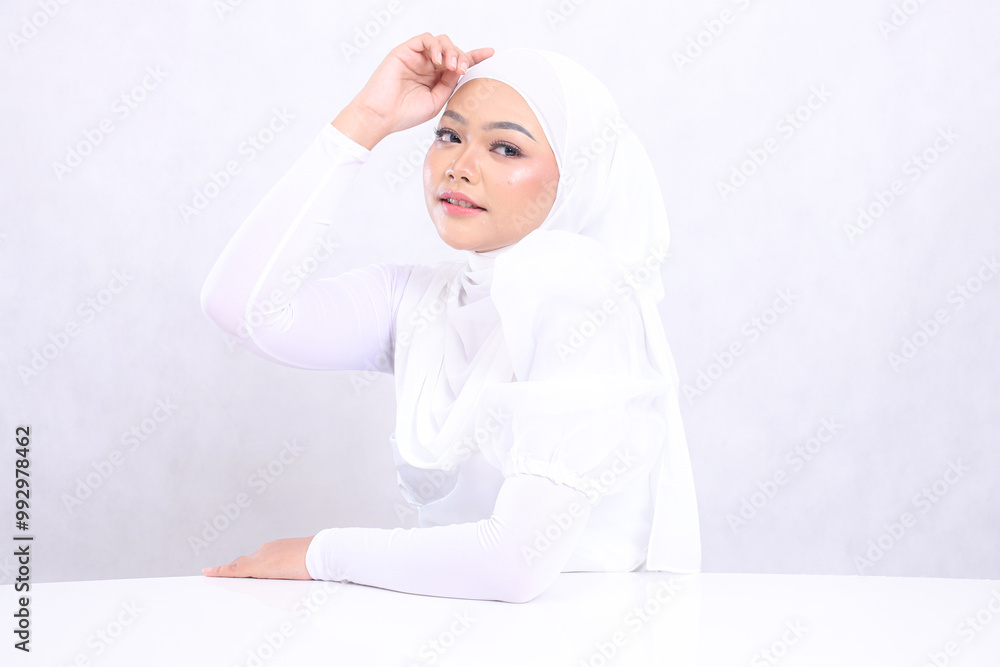 Beauty Young woman casual candid left hand above head with bright, glowing and smooth skin tone. studio on isolated white background for skin care concept. beauty and health Beauty Young woman casual candid left hand above head with bright, glowing and smooth skin tone. studio on isolated white background for skin care concept. beauty and health