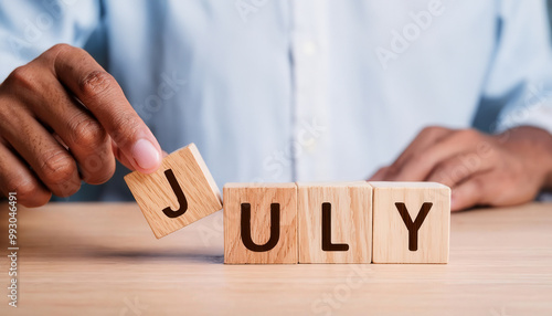 Wallpaper Mural A person is holding wooden blocks Torontodigital.ca