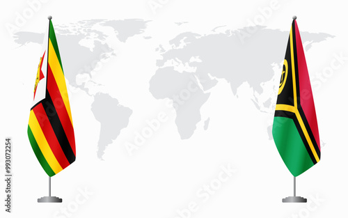 Zimbabwe and Vanuatu flags for official meeting against background of world map.
