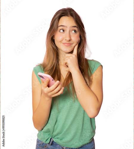 Portrait of a pensive young casual caucasian woman looking side mobile phone isolated over transparent background