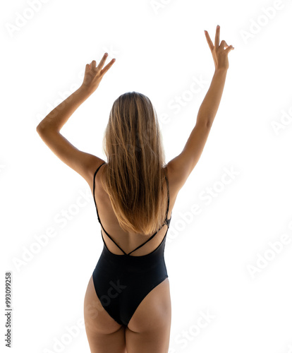 Young woman from back in black swimsuit with victory sign gesture over transparent background.