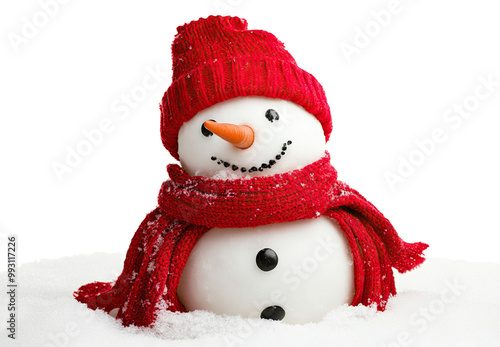 Smiling snowman in red hat and scarf, standing in snow, isolated on transparent cutout background photo