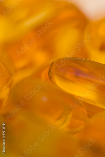 Extreme close up of cod liver oil pills
