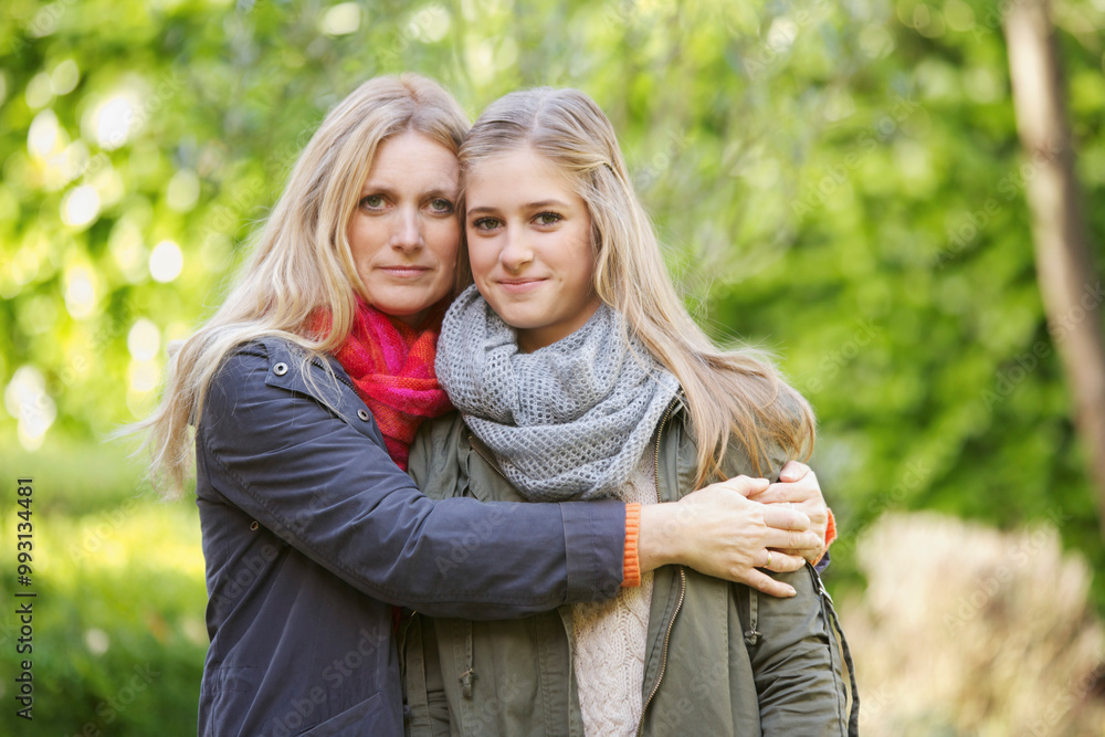 Mother Hugging Daughter Outdoors
Mother Hugging Daughter Outdoors